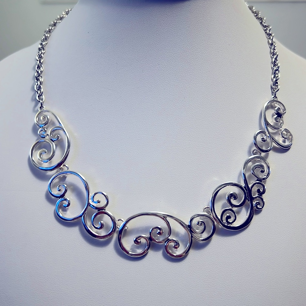 New Scroll silver necklace with tags